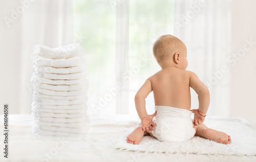 Back view of baby in comfortable disposable diapers
