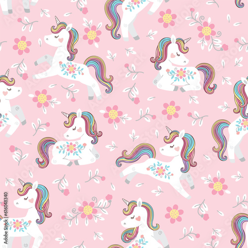 White unicorn with rainbow mane and tail. Vector seamless pattern with cute unicorns on a pink floral background