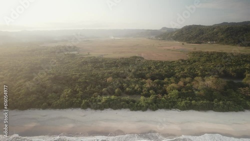 Sumba beach Indonesian island in Eastern Indonesia Nusa Tenggara aerial footage drone revealing scenic tropical lonely beach  photo