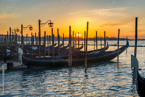 Gondolas of Venice at sunrise, Italy, Europe. © Viliam
