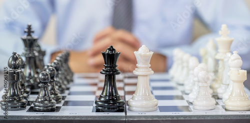 chess pieces, Businessman thinking for moving with white background, challenges planning business strategy to success concept