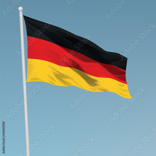 Waving flag of Germany on flagpole. Template for independence