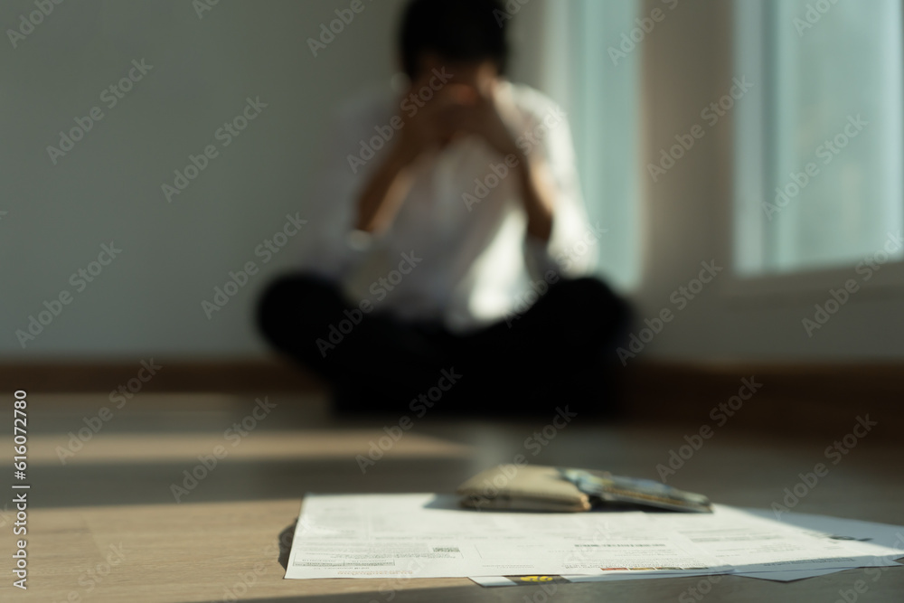 Stressed and headache asian man with large bills or invoices no money to pay to expenses and credit card debt. shortage, Financial problems, mortgage, loan, bankruptcy, bankrupt, poor, empty wallet Stressed and headache asian man with large bills or invoices no money to pay to expenses and credit card debt. shortage, Financial problems, mortgage, loan, bankruptcy, bankrupt, poor, empty wallet