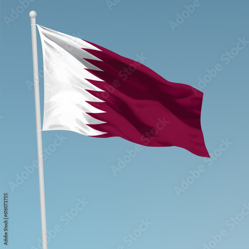 Waving flag of Qatar on flagpole. Template for independence day