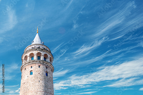 Galata tower against stunning cloudy sky - Istanbul, Türkiye
