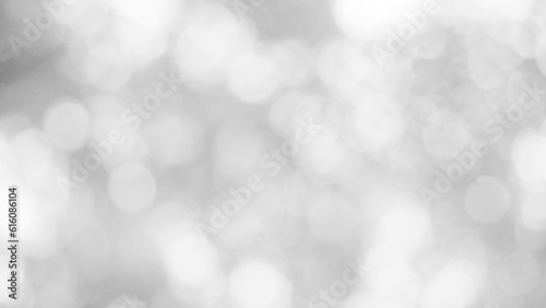 The illuminated white bokeh image can be used as a background illustration or add text.