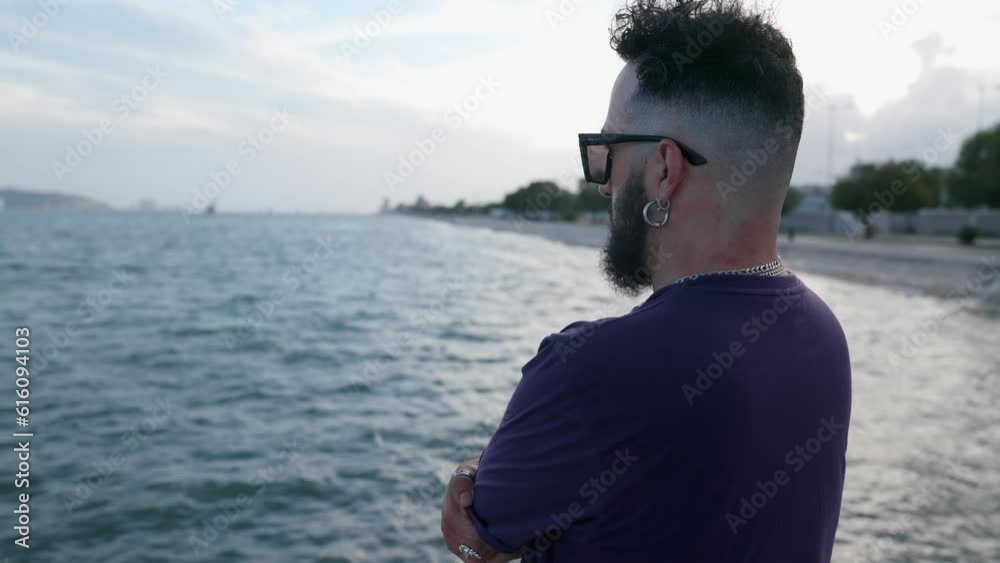 Modern male in sunglasses suffering and being depressed Modern male in sunglasses suffering and being depressed
