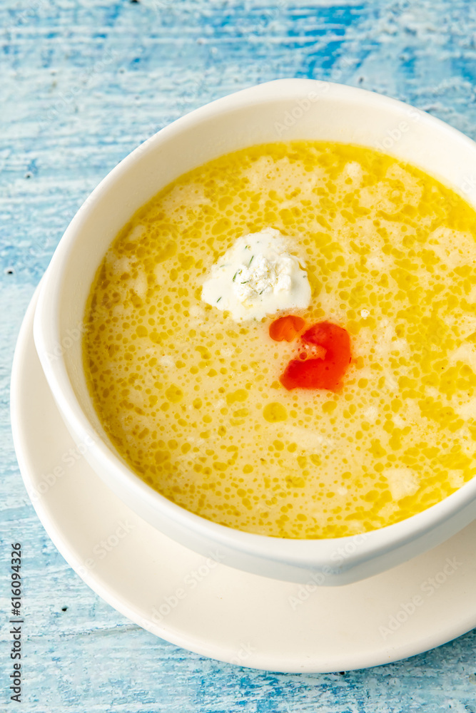 Seasoned fish soup on a white porcelain plate Seasoned fish soup on a white porcelain plate