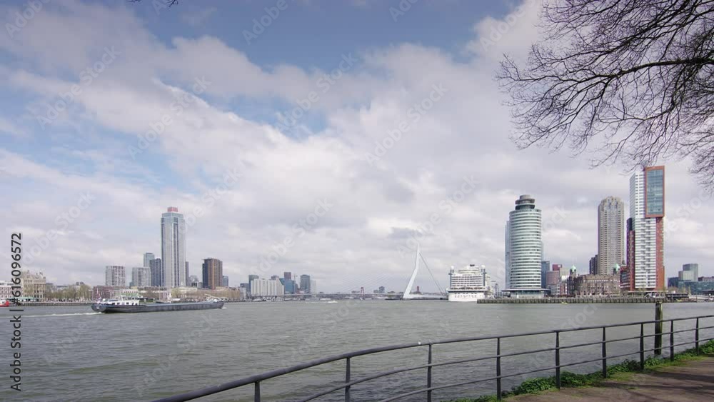 Rotterdam city center on the left, Kop van Zuid on the right connected by the Erasmus bridge. Rotterdam city center on the left, Kop van Zuid on the right connected by the Erasmus bridge.