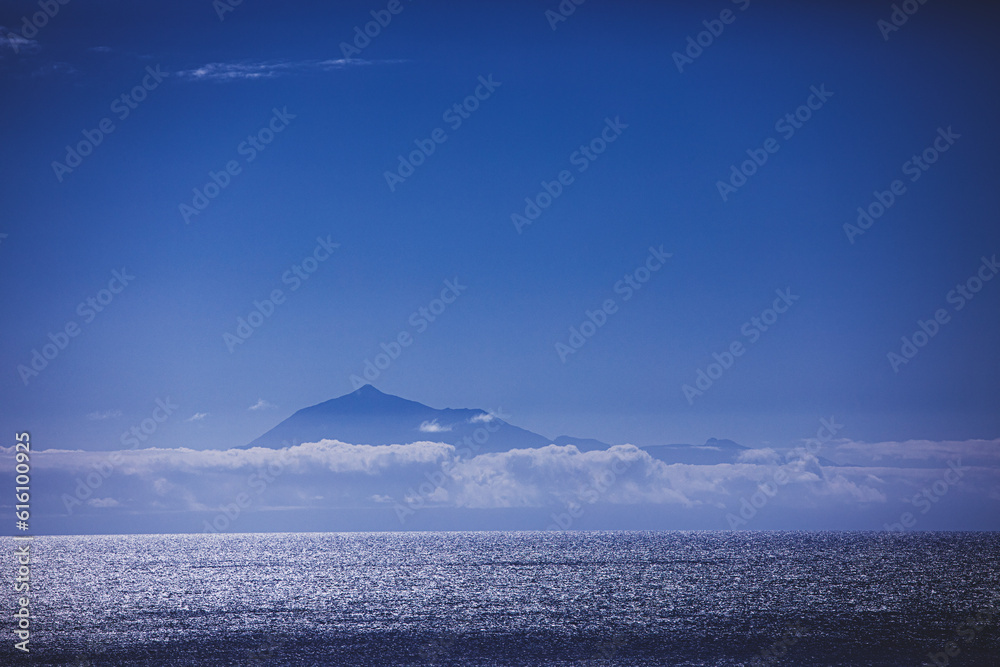 Silhouette of the volcano Teide seen from La Palma island on a sunny day.