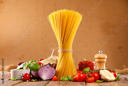 Ingredient for cooking italian pasta- Spaghetti, tomato sauce and ingredients