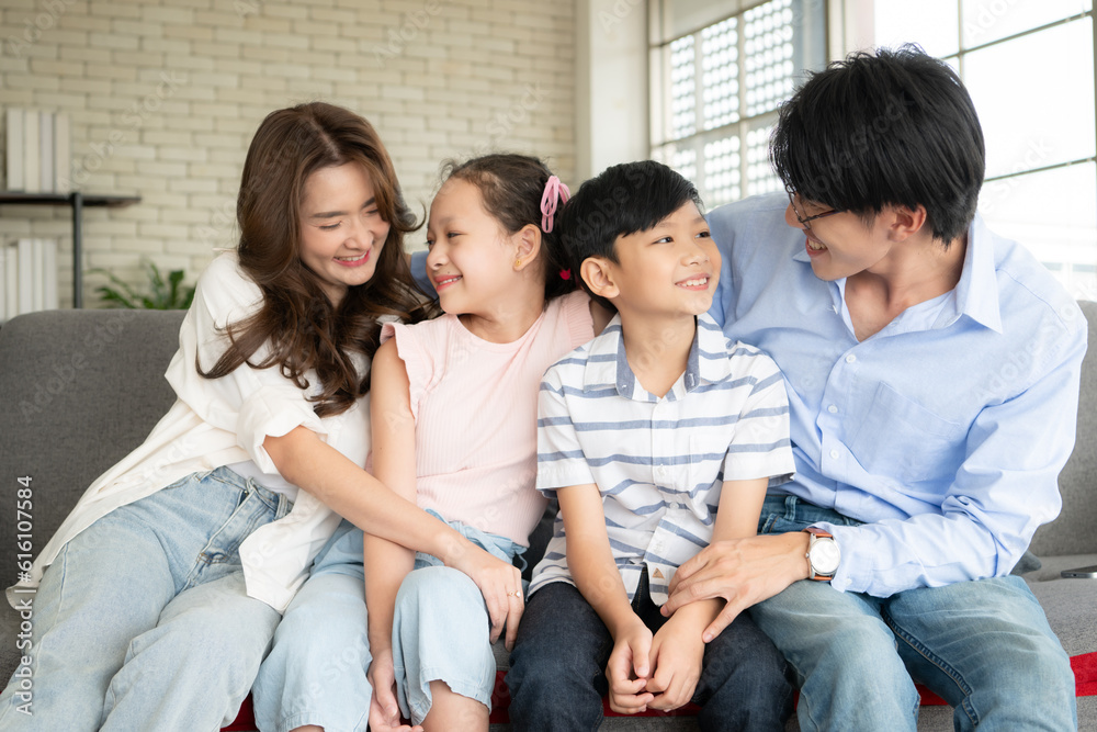 A boy and a daughter from an asian family.