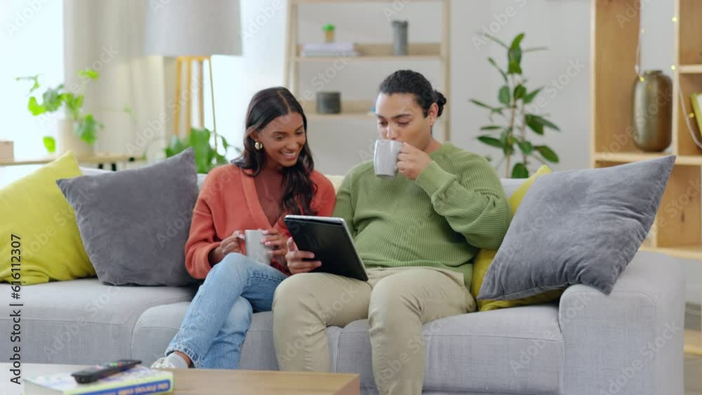 Tablet, sofa and happy couple with coffee, relax and talking, conversation or planning life together at home. Living room, tea or drink of interracial woman and partner on couch and digital streaming Tablet, sofa and happy couple with coffee, relax and talking, conversation or planning life together at home. Living room, tea or drink of interracial woman and partner on couch and digital streaming
