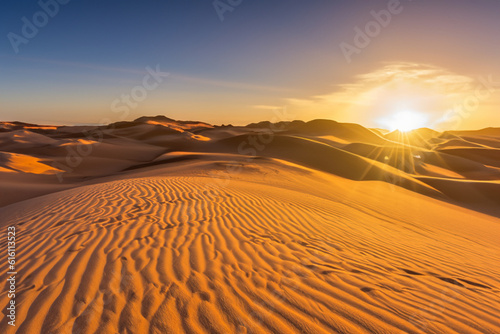 Sand dunes at sunrise- Witness the beauty of sand dunes as the sun rises, casting ethereal light and shadows, creating a surreal and ever-changing landscape 