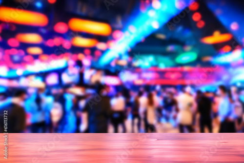 Blurred Busy Nightclub Background with a Clean Wooden Table in the Foreground