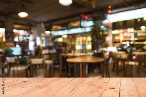 Blurred Bustling Café Background with a Clean Wooden Table in the Foreground
