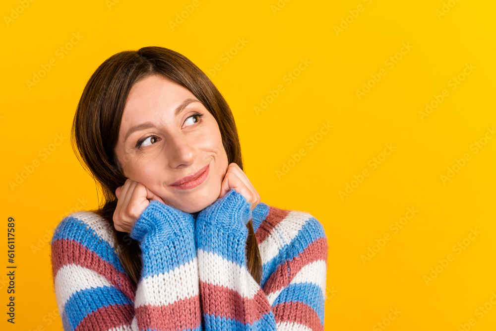 Portrait of young woman look up copyspace isolated on bright yellow color background Portrait of young woman look up copyspace isolated on bright yellow color background