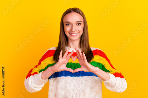 Photo of flirty brunette millennial lady show heart wear pullover isolated on bright color background