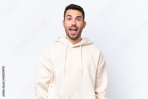Young caucasian man isolated on white background with surprise facial expression © luismolinero