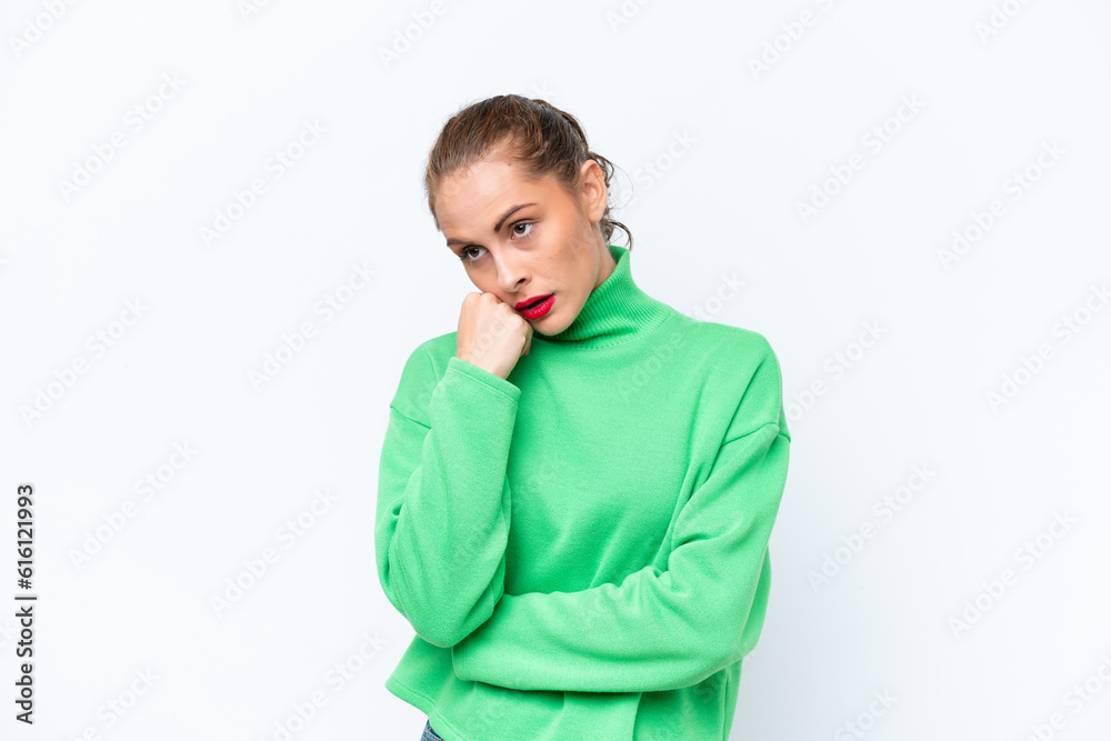 Young caucasian woman isolated on white background with tired and bored expression Young caucasian woman isolated on white background with tired and bored expression