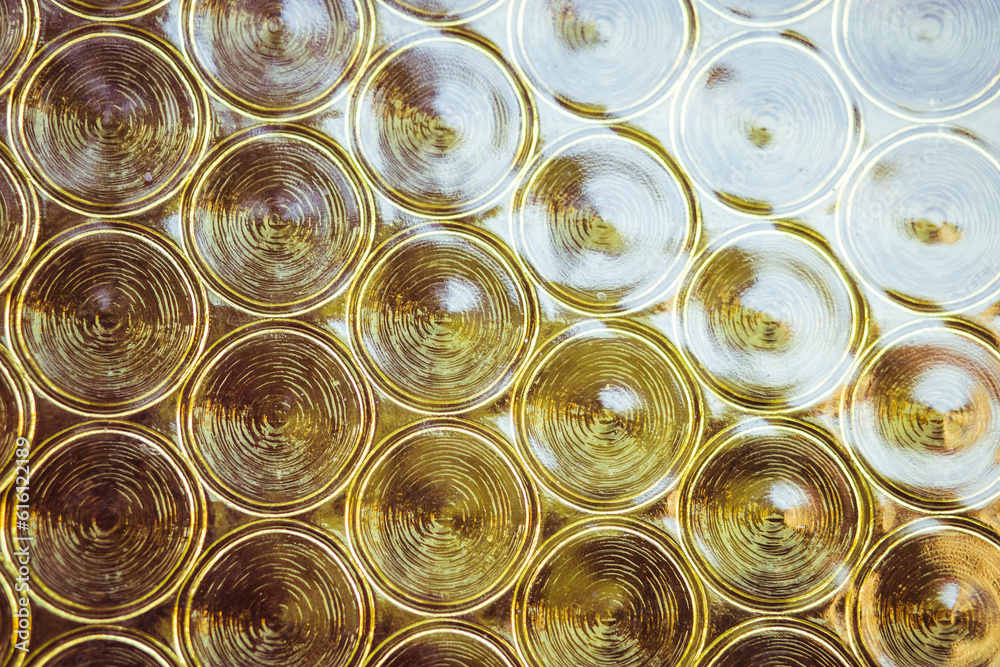 Abstract background with patterned glass. Art deco circles decoration for interior design. Vintage patterns in the play of light Abstract background with patterned glass. Art deco circles decoration for interior design. Vintage patterns in the play of light