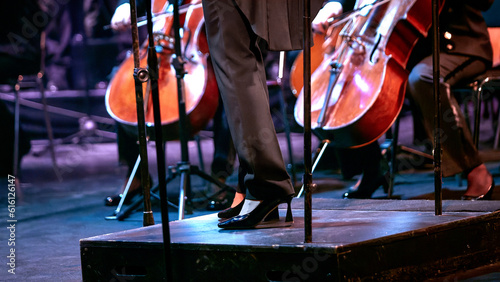  woman conductor conducting symphony orchestra
