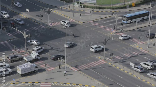 Sharjah, UAE,  December 3, 2022 Al Ittihad Park Pedestrian Road crossing in Sharjah during the Early Morning SLOG UNGRADED VIDEO photo