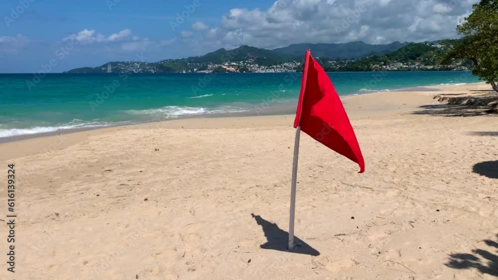 Red flag warning holidaymakers not to enter Caribbean sea due to rip tide. With sound.