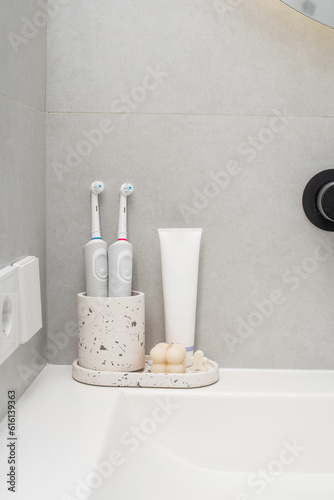 A pair of electric brushes and toothpaste material for mockup composition of hygiene products