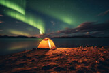 camping with tent to see the gorgeous green northern lights Ice mountains and oceans winter at night.Generative AI.
