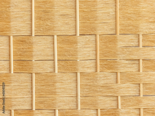 woven bamboo background brings a sense of natural beauty and exotic charm  with its intricate patterns and earthy tones creating unique visually captivating backdrop. Whether used in interior design 