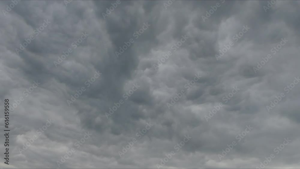 Sky background - time lapse with blue sky and moving clouds. Sky with the change of clouds moving and the direction of the wind in the sky changing.