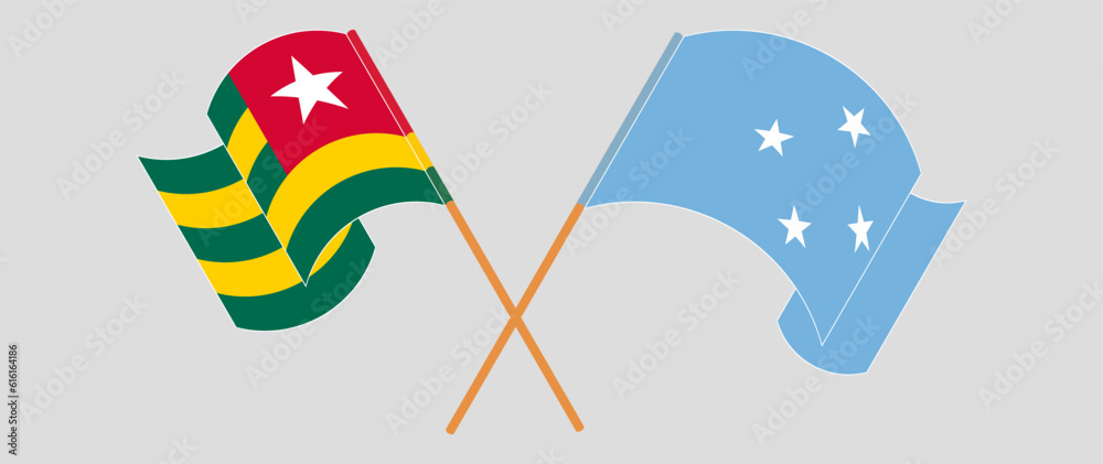 Crossed and waving flags of Togo and Micronesia Crossed and waving flags of Togo and Micronesia