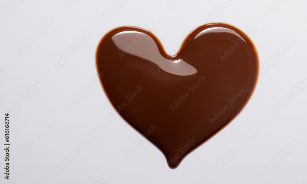 heart made of melted chocolate. Conceptual idea for Valentine's Day. A sweet love. heart made of melted chocolate. Conceptual idea for Valentine's Day. A sweet love.