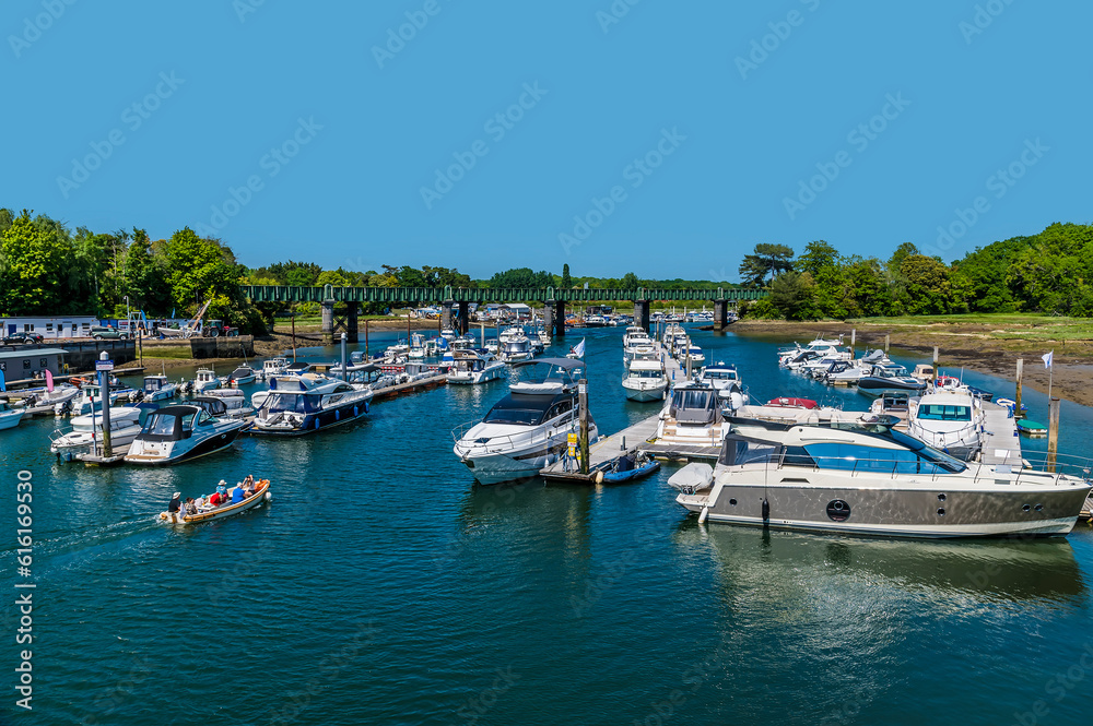 A view towards the railway bridge up the River Hamble, Hampshire in summertime