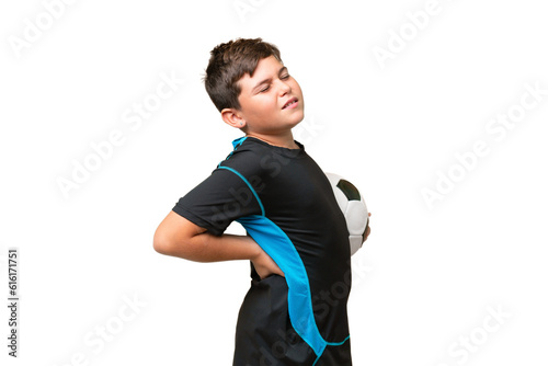 Little caucasian football player kid over isolated chroma key background suffering from backache for having made an effort © luismolinero