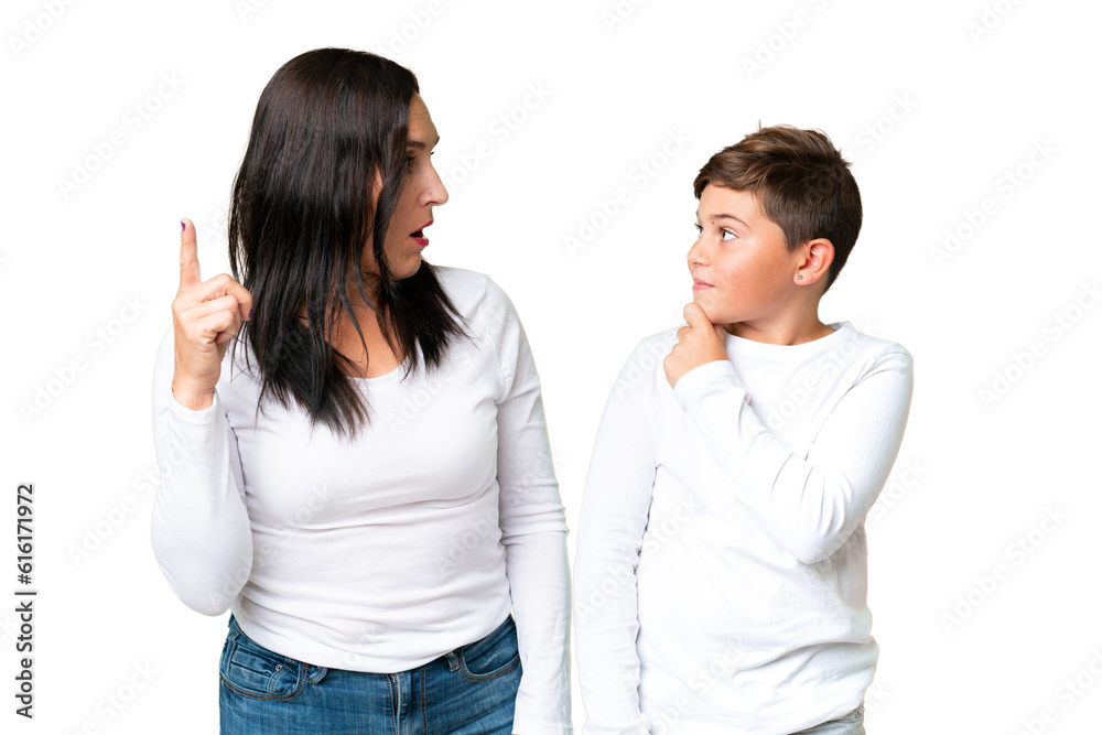 Little caucasian kid over isolated chroma key background standing and thinking an idea Little caucasian kid over isolated chroma key background standing and thinking an idea