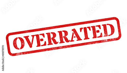 Overrated red rubber stamp isolated on transparent background with distressed texture effect photo