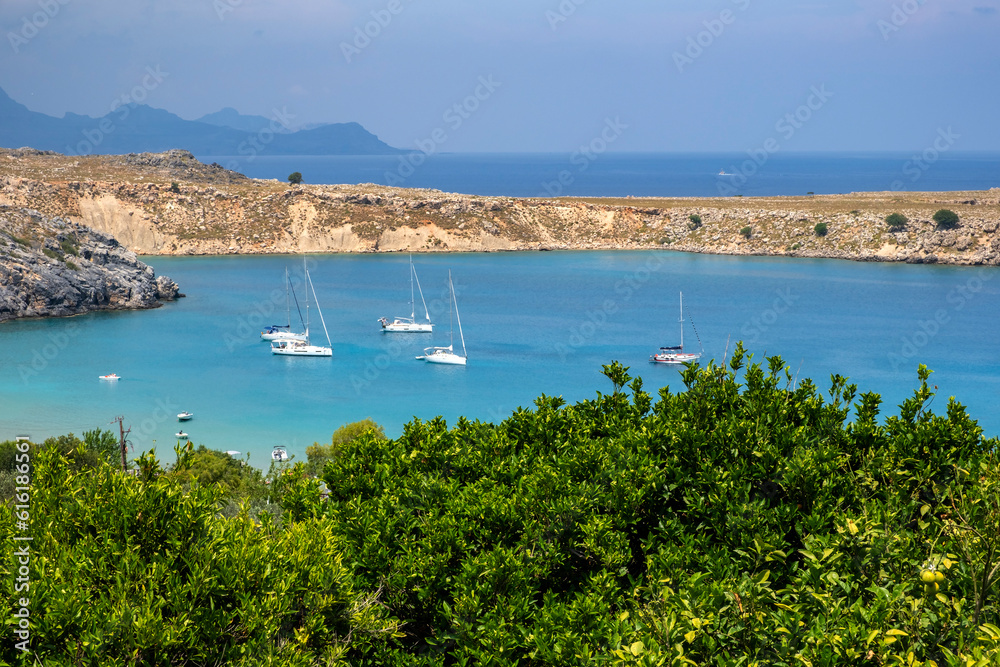 High View of the Mediterranean Sea  in Lindos Rhodes Dotted With Sailboats