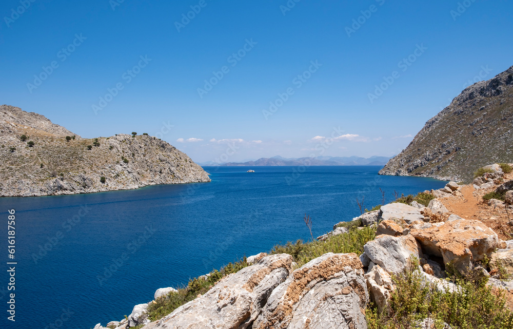 A View of the Beautiful Mediterranean Sea and Mountains Near St. Nicholas Beach Symi Greece on Sunny Day