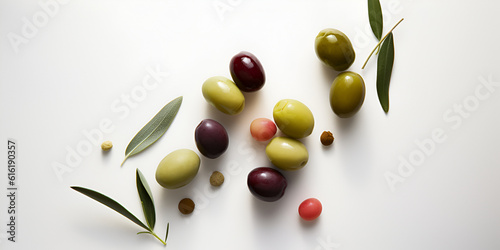 Delicious black, green and red olives with leaves isolated on white background, view from above. AI generated