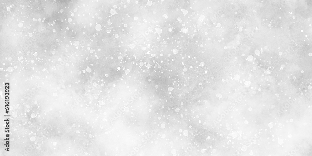 Abstract winter morning shiny white snow is falling randomly with various bokeh particles, beautiful grey watercolor background with glitter particles for wallpaper and design and presentation.