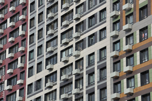 Modern residential high-rise building with baskets for air conditioners in Moscow, Russia