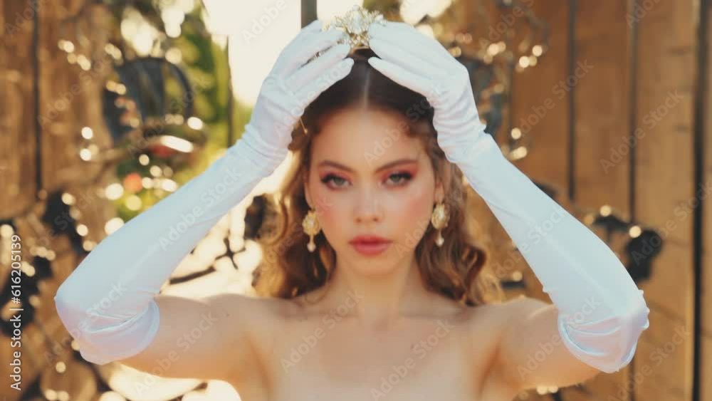 Close-up art portrait young woman princess wears royal crown on head ...