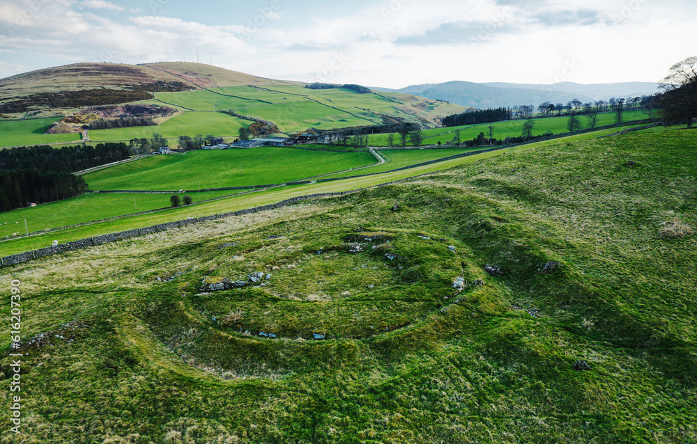 Torwoodlee prehistoric broch circular stone foundation circa 100 AD beside ramparts of older Iron Age fort. Showing entrance and intramural chambers