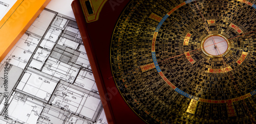 Antique chinese feng shui compass on home desing on background