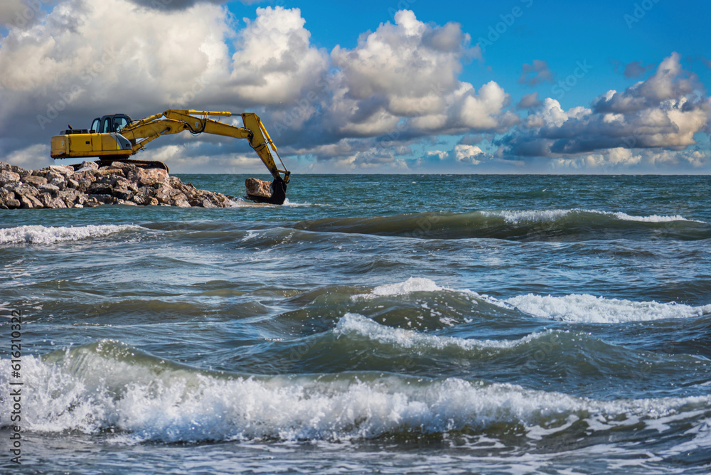 Fototapeta premium Construction of breakwater cliffs to defend the coastline from storms