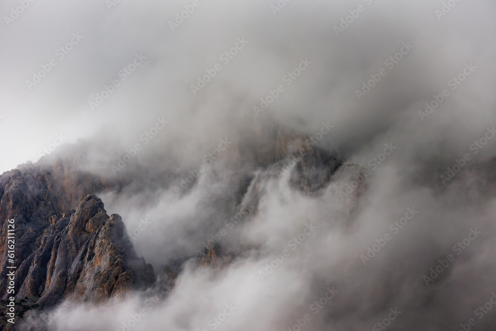 Passing clouds over a landscape in Turkey with mountain peaks in the background. Landscape of mountain range and mountains. Dedegol. Turkey.