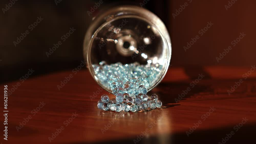 Gems come out of a glass chalice Gems come out of a glass chalice