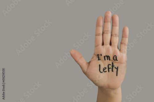 International day of the left-handed, I'm lefty, text on hand with copy space photo